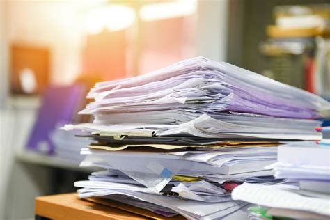 10 Ways To Reduce Paper Clutter In Your Home Simply Home Downsizing