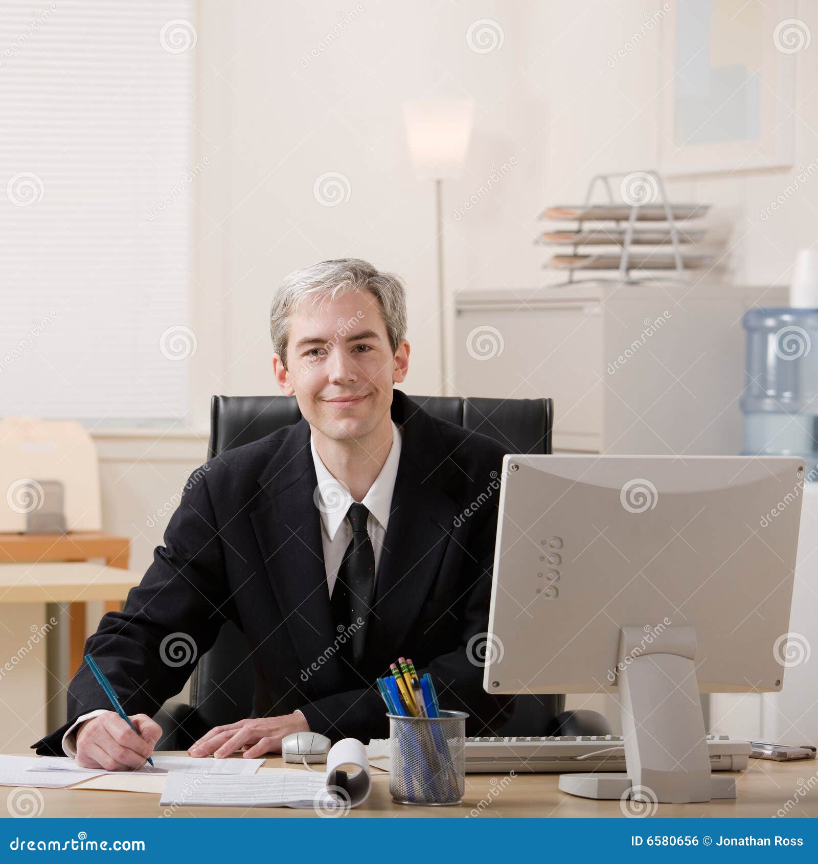 105 Businessman Filling Out Paperwork Desk Stock Photos Free Amp Royalty Free Stock Photos From