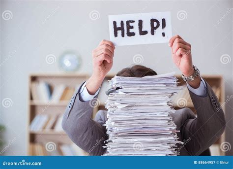 Woman Overwhelmed by Office Paperwork