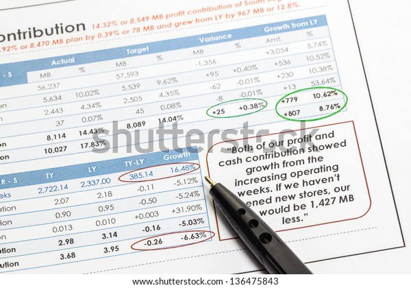 Analyzing Finance Paperwork With Key Hi Light Stock Photo 136475843 Shutterstock