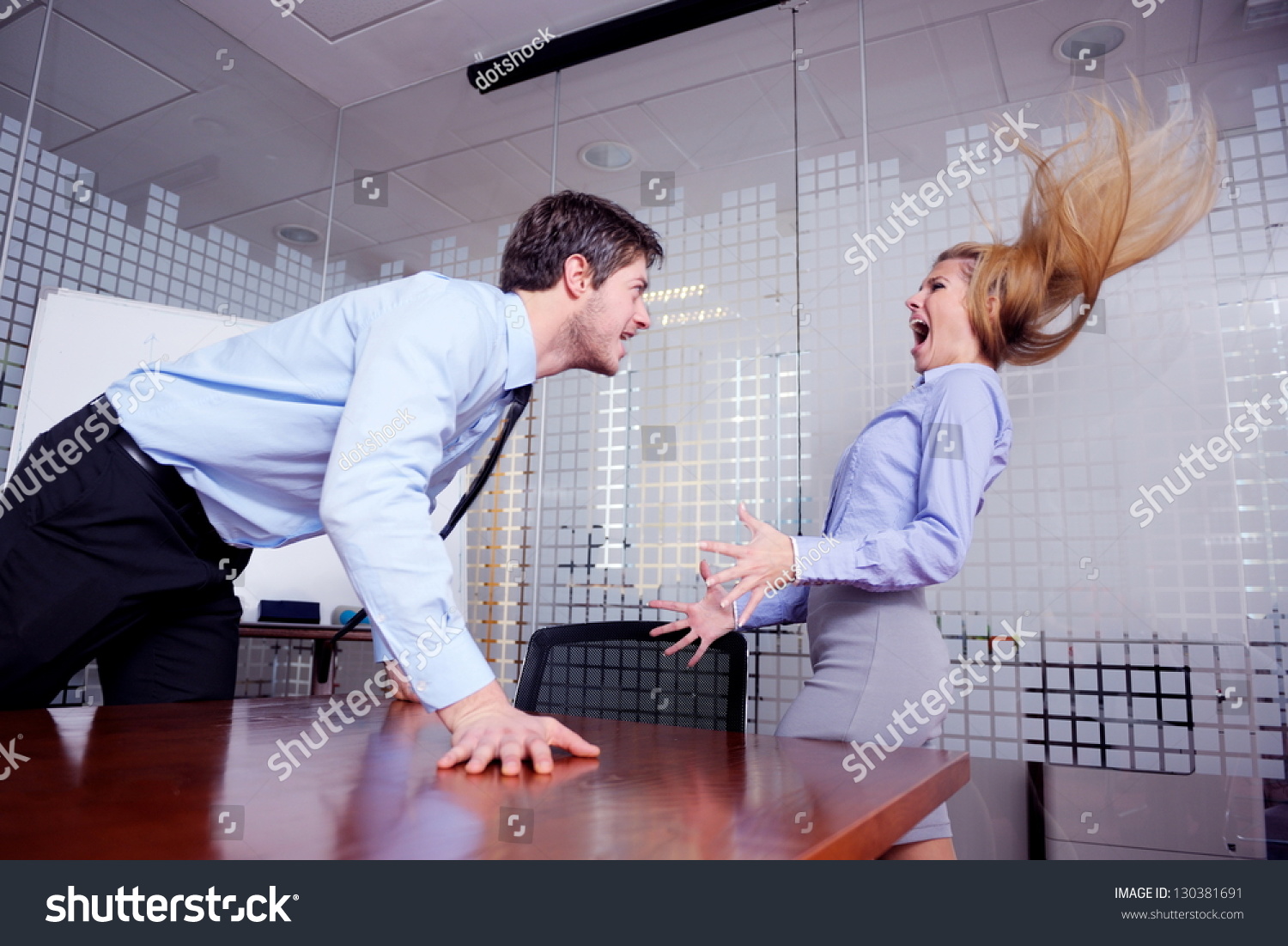 Angry Business Man Screaming At Employee In Office Stock Photo Image