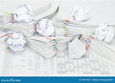 Bankruptcy Of House And Paper Ball On Overload Paperwork Stock Photo