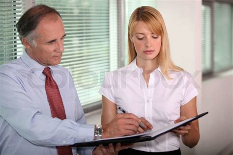 Boss Signing Paperwork Stock Image Colourbox