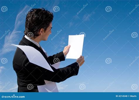 Businessman Looking Over Paperwork Stock Photo Image Of Leadership Confident 4214548