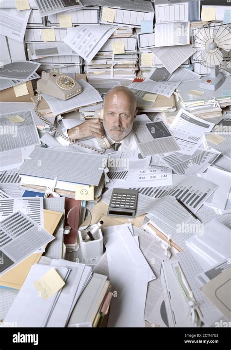 Businessman Overwhelmed And Stressed From Paperwork Stock Photo Alamy