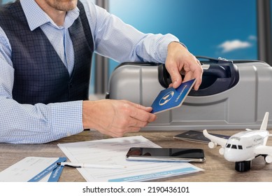 Businessman Preparing His Flight Documents Before Stock Photo