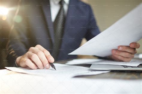 Businessman Reviewing Paperwork Stock Photos Motion Array