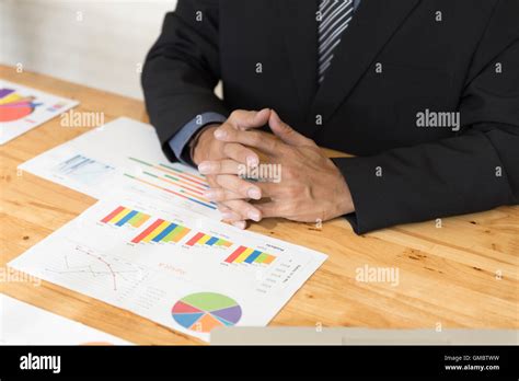 Businessman Working With Chart Diagram Analysis Paperwork Document