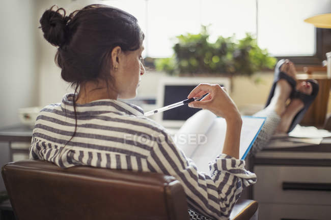 Businesswoman Reading Paperwork Stock Image F014 0190 Science