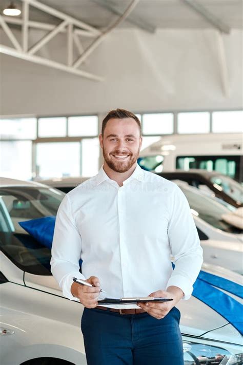 Car Dealership Portrait Or Happy Man With Paperwork For Vehicle