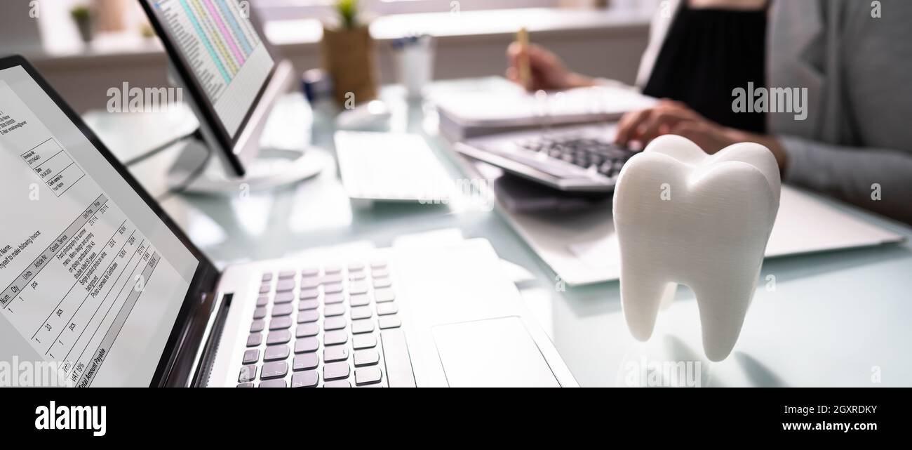 Dentist Bill And Tax Paperwork At Desk Stock Photo Alamy