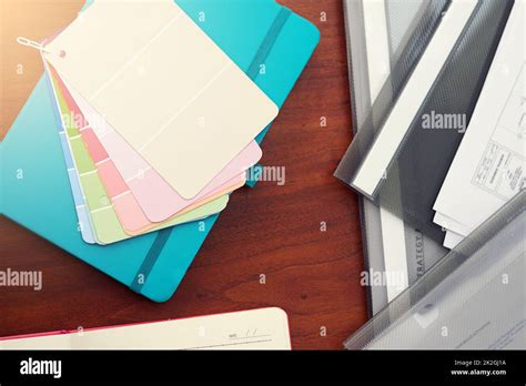 Designers Essentials High Angle Shot Of Color Swatches And Paperwork