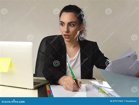 Desperate And Stressed Business Woman Working Overwhelmed At Office