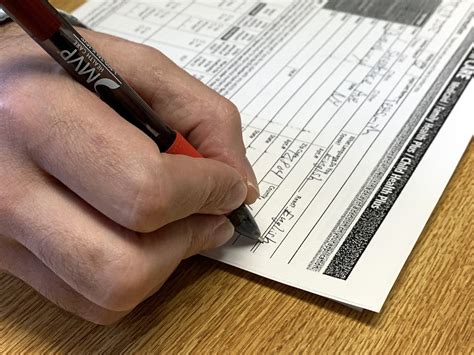 Detail Of Filling Out Paperwork Southern Adirondack Independent Living Center Sail Helps