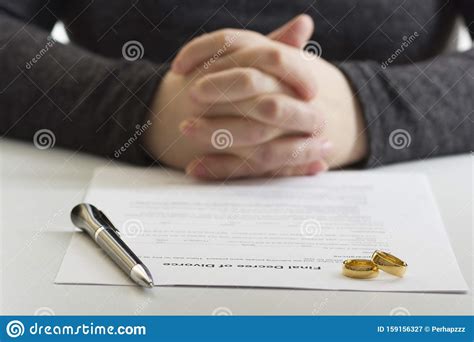 Divorce Concept Hands Of Wife Husband Signing Decree Of Divorce