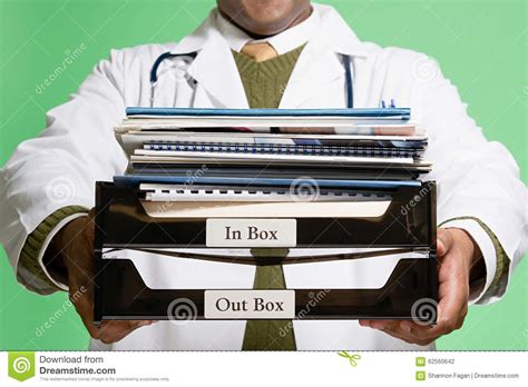 Doctor Holding A Stack Of Paperwork Stock Photo Image Of Background