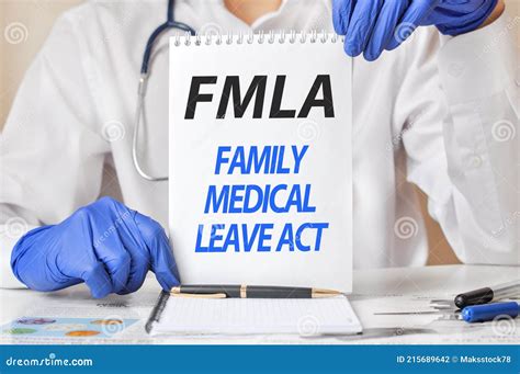 Doctor Holding A Tablet With Text Fmla Fmla Family Medical Leave