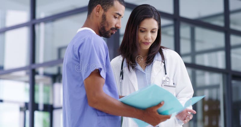 Doctors Nurses And Folder For Teamwork Clinic Documents And Patient