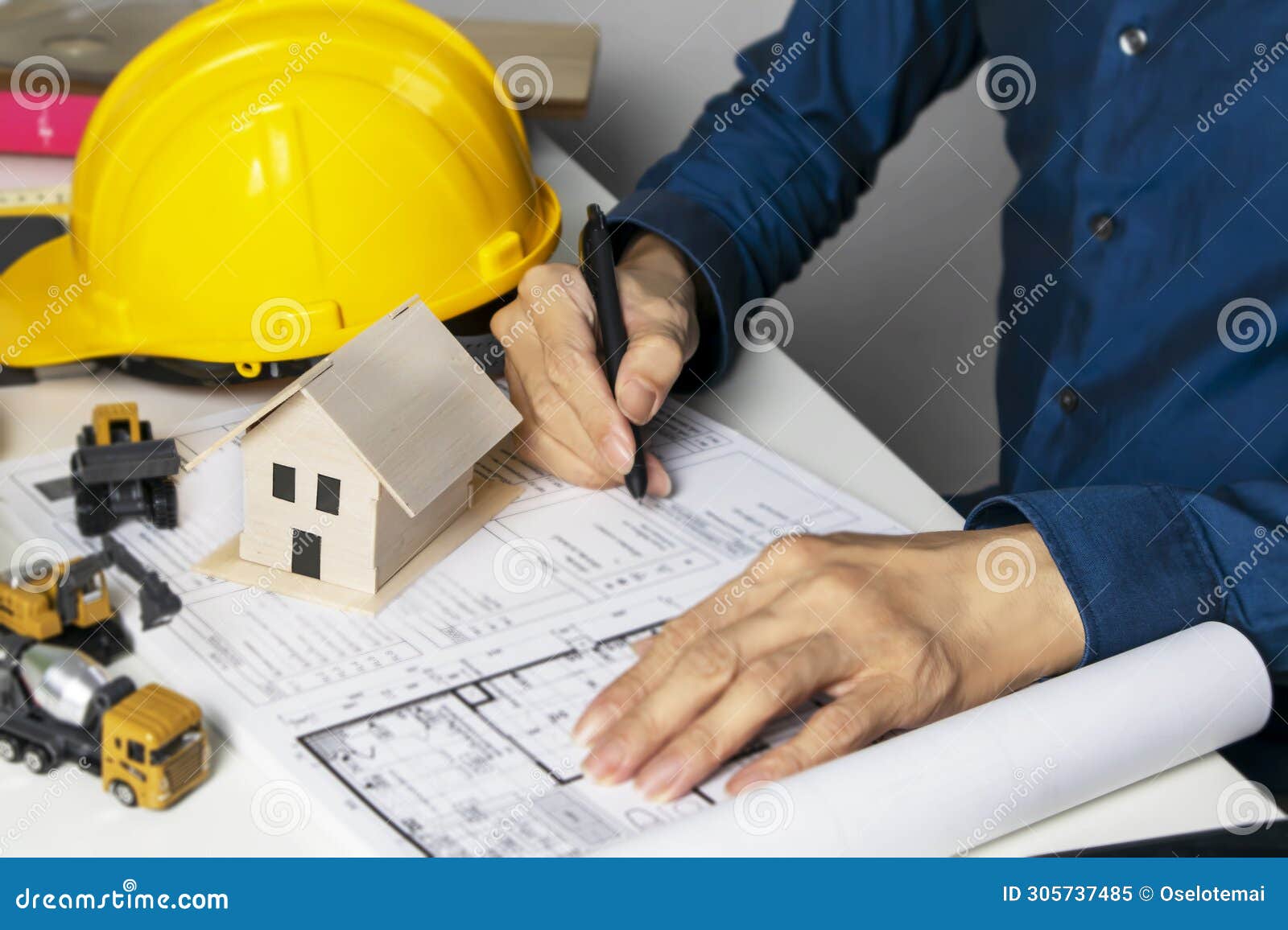 Engineers Sit And Work On Building Design And System Work Construction