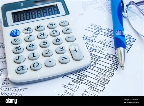 Financial Accounting With Tax Papers Pen And Calculator Stock Photo Alamy