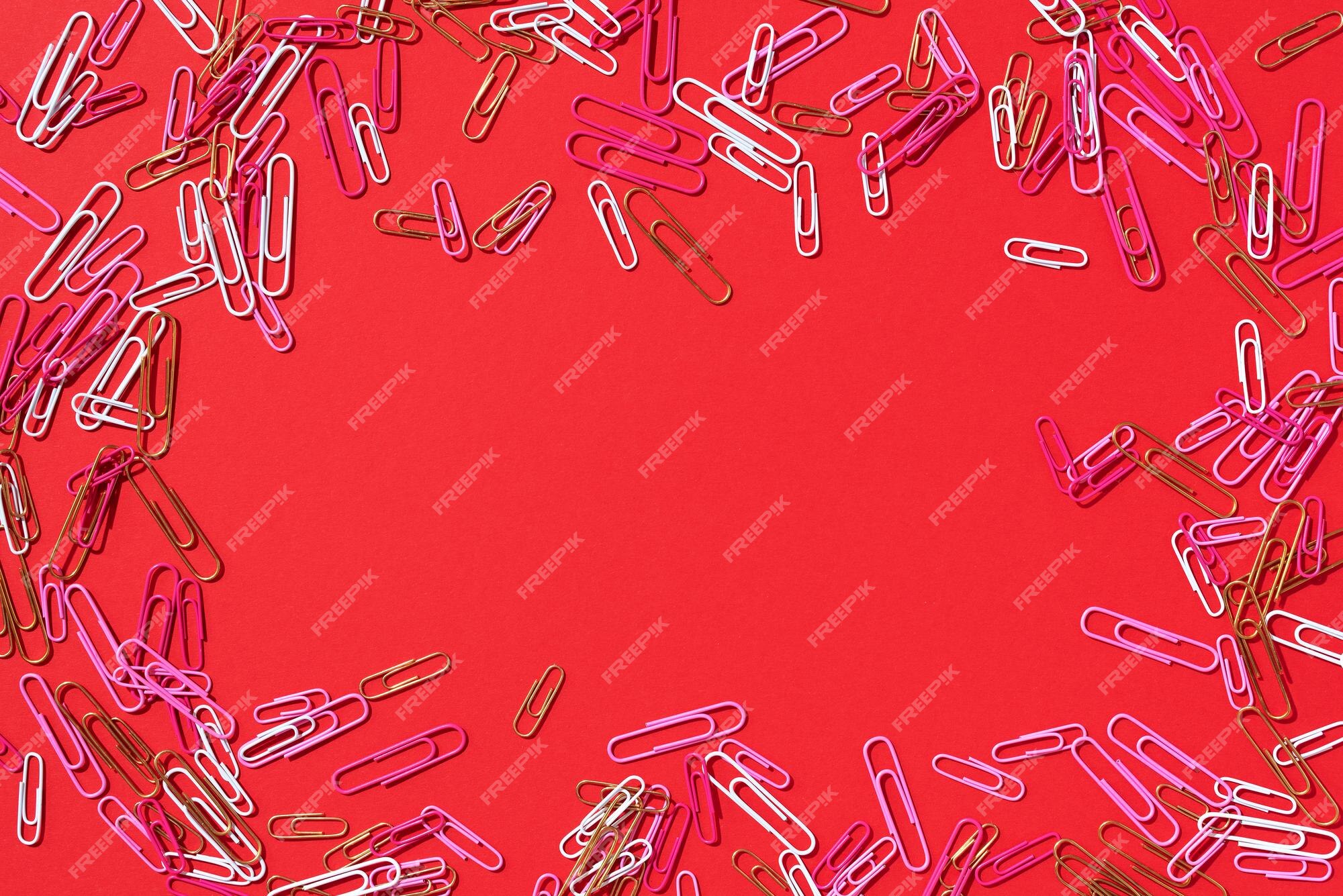 Frame Of Multicolored Paper Clips On Red Background Back To School