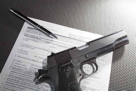 Handgun With Purchase Paperwork And Pen Stock Photo Image Of Dishonorable Polymer 110134166