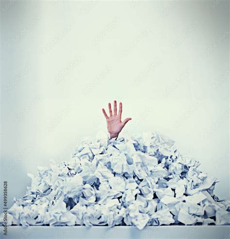 Help Im Drowning In Paperwork Cropped Shot Of A Businessman Buried Under A Pile Of Crumpled Up