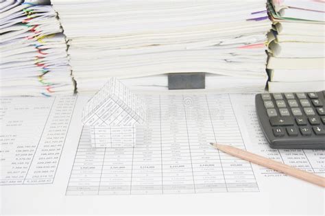 House And Pencil Have Paperwork With Books As Background Stock Image