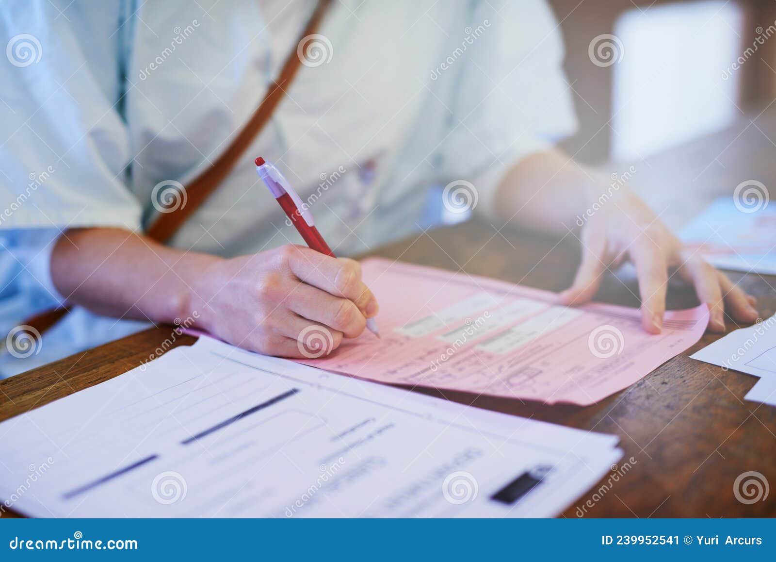 Important Patient Paperwork Cropped Shot Of A Doctor Filling Out