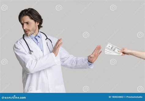 Male Doctor Refusing To Take Bribery Money From Patient Stock Photo Image Of Concept