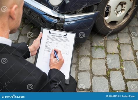 Man Filing Insurance Claim Form Stock Image Image Of Loss Form 54648793