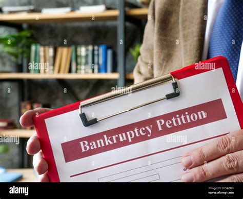 Manager Proposes Bankruptcy Petition Form For Signing Stock Photo Alamy