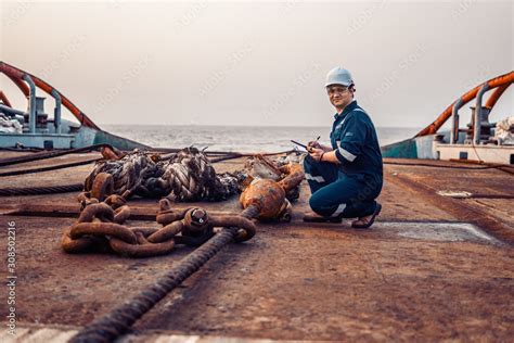 Marine Chief Officer Or Chief Mate On Deck Of Ship Or Vessel He Fills