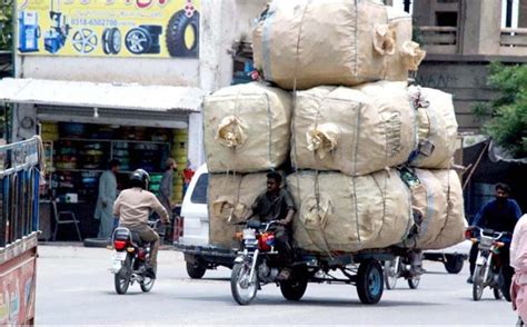 Motorcycle Loader Taking Away Empty Bottles To Packing Point From Where