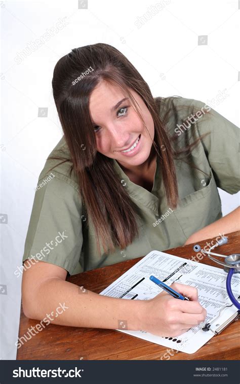 Nurse Doing Paperwork Stock Photo 2481181 Shutterstock