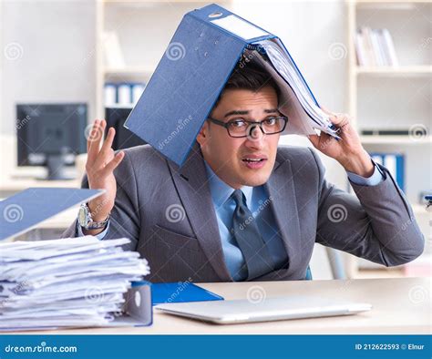 Overloaded With Work Employee Under Paperwork Burden Stock Image