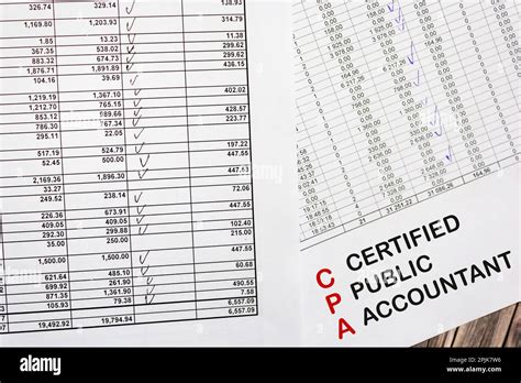 Paper With Cpa Certified Accountant On Documents And Desktop Stock