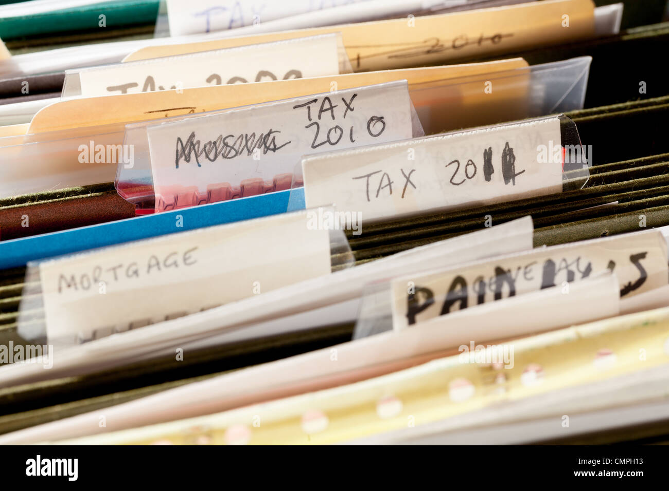 Paperwork Folders In File Drawer Sorted Into Tax Years And Mortgage