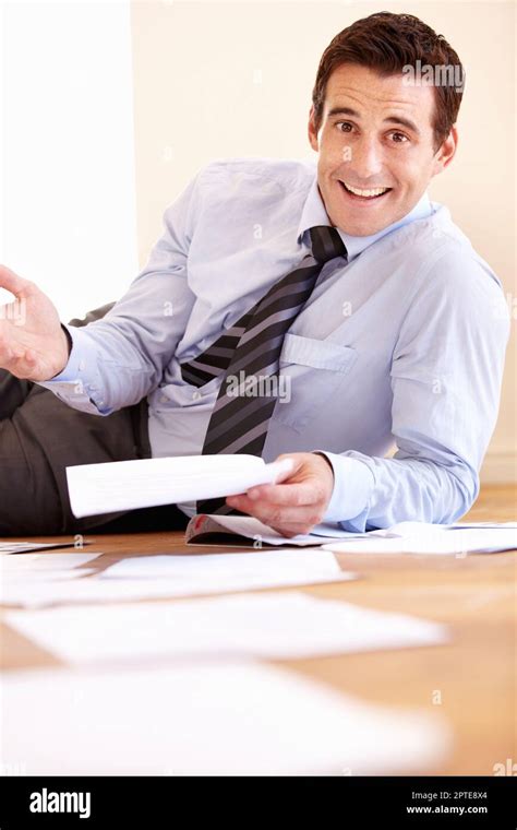 Paperwork Youve Just Got To Get Through It Smiling Young Businessman