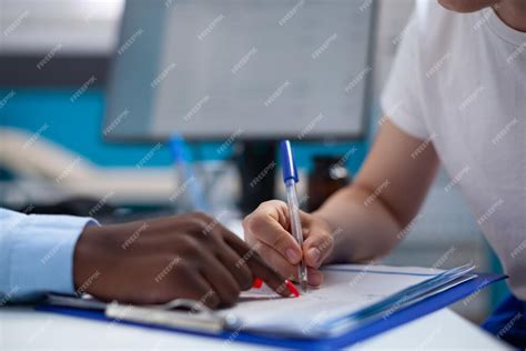 Patient Writing Signature On Medical Insurance Report Application Form