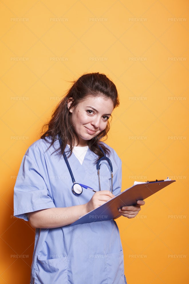 Physician Reviewing Hospital Paperwork Stock Photos Motion Array