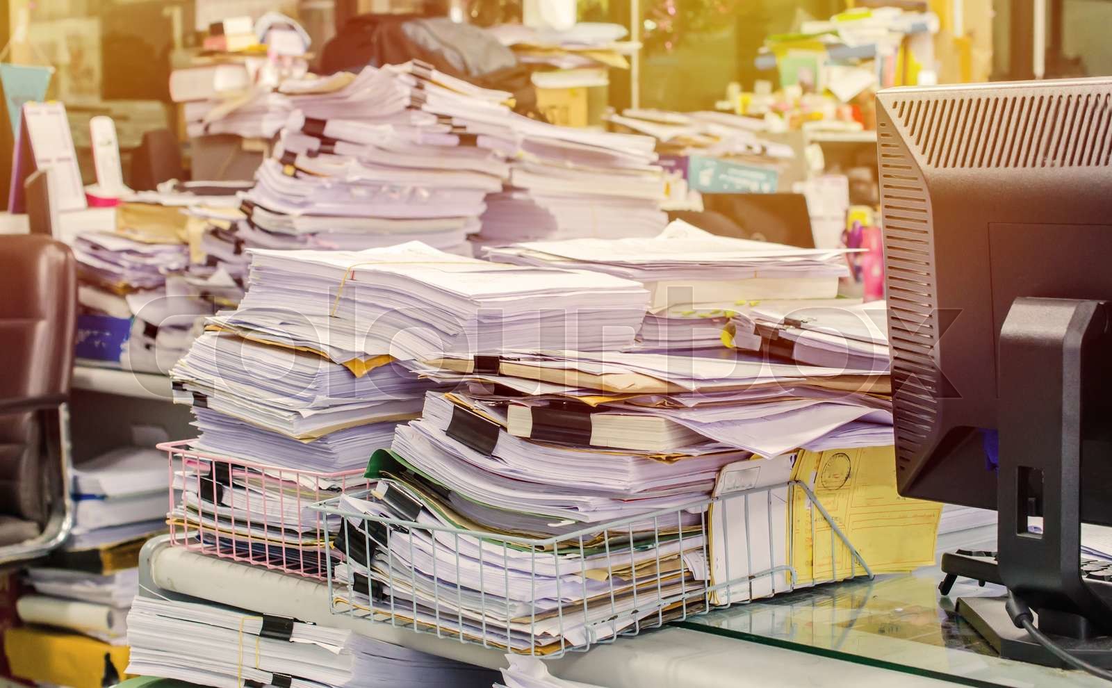 Pile Of Documents On Desk Stack Up High Waiting To Be Managed Stock