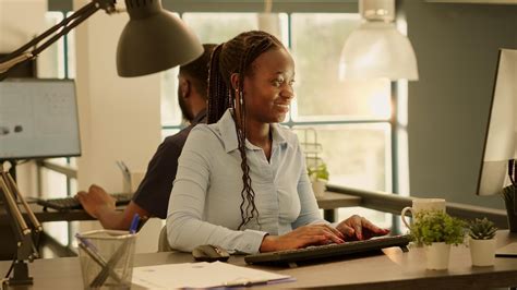 Premium Photo Business Woman Browsing Internet On Computer To Work On Report Creating Startup