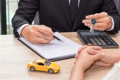 Premium Photo Businessman Giving Car Key Over Car Loan Application