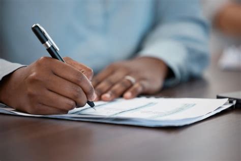 Premium Photo Hands Documents And Contract With A Black Man Signing