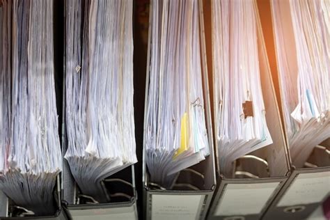 Premium Photo High Angle View Of Paperwork On Table