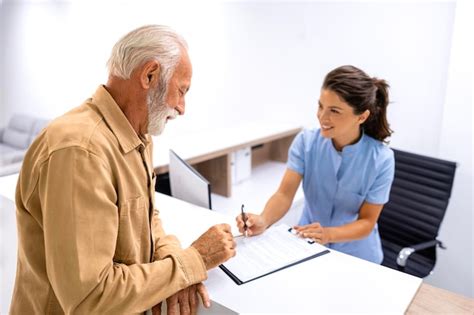 Premium Photo Patient Doing Paperwork And Health Status In Hospital