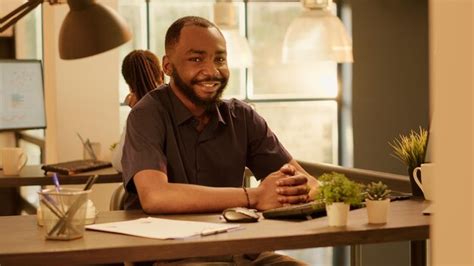 Premium Photo Portrait Of Business Man Working On Computer Network In Office With Big Windows