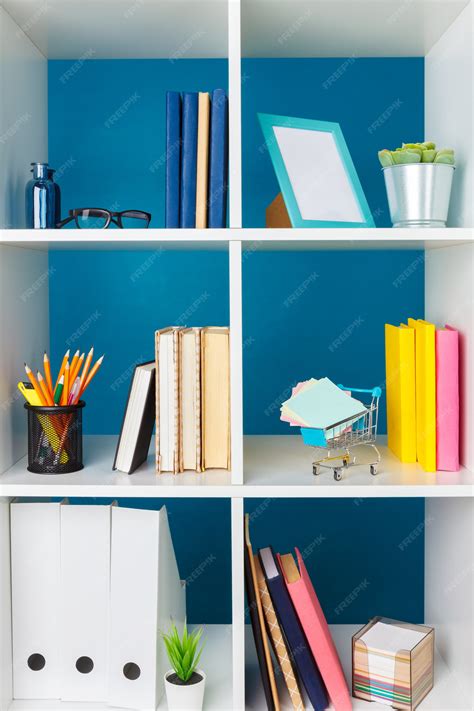 Premium Photo Stacks Of Supplies And Paperwork In The Office And Bookshelves