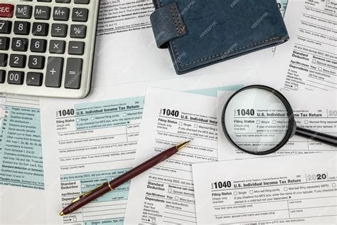 Premium Photo The Concept Of The Deadline For Paperwork Blank Tax